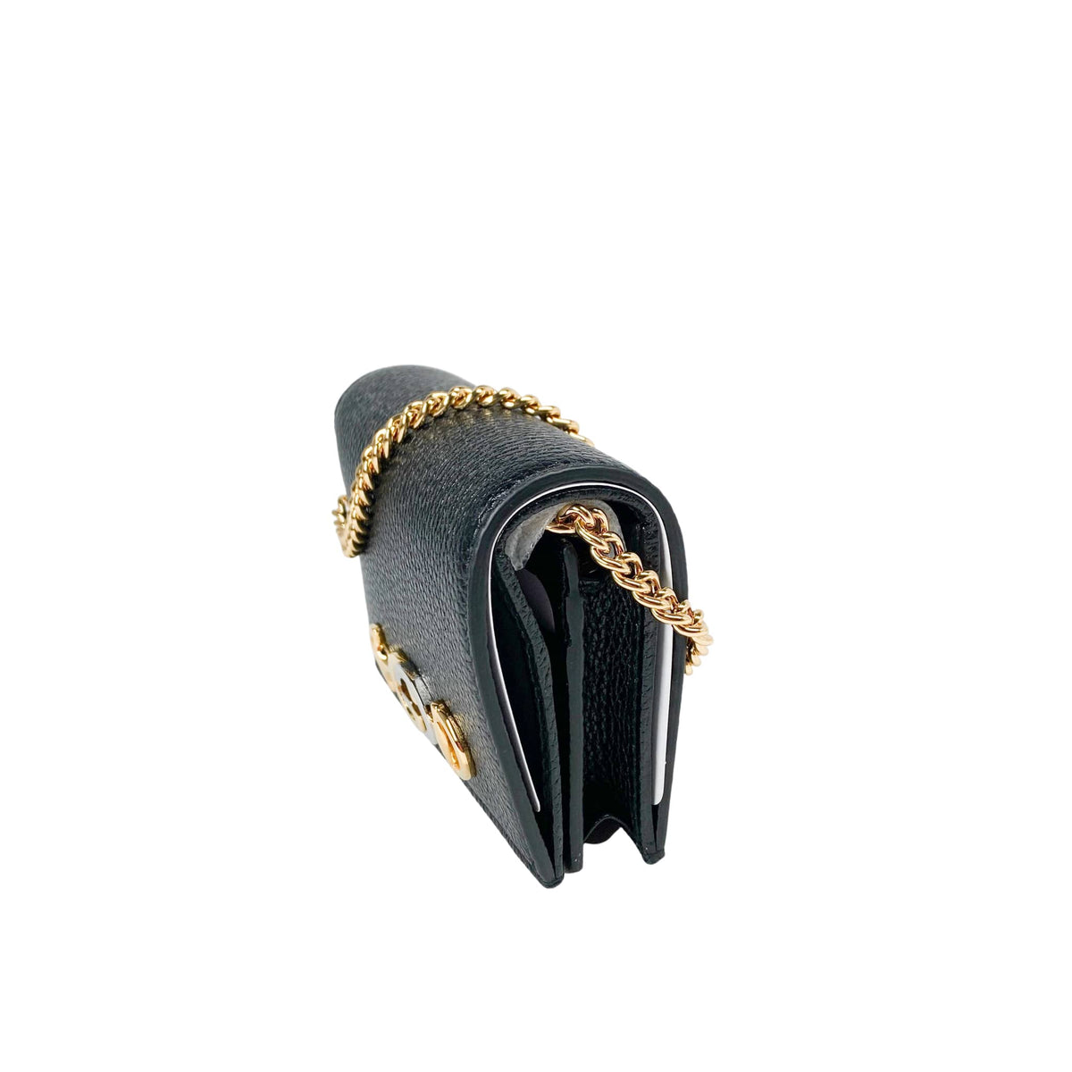 Side profile view of the compact Gucci Zumi black leather card holder, demonstrating its slim structured expansion.