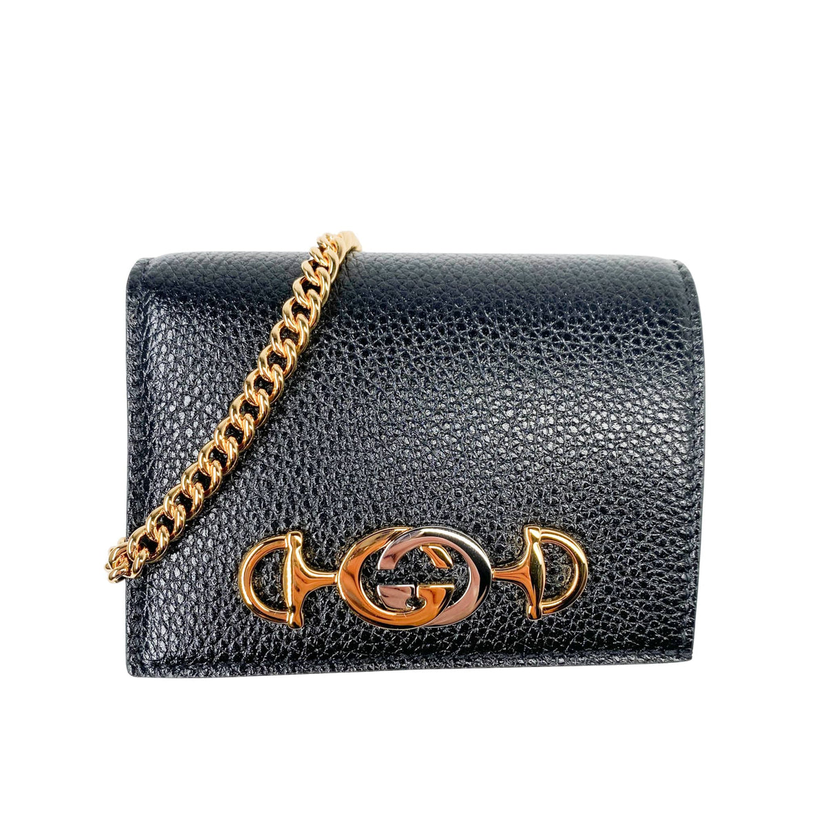 Front view of the black leather Gucci Zumi wallet with delicate gold chain strap attached.