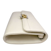 Side view of Gucci Interlocking GG Clutch - elegant white leather design showcasing dual-tone metal logo and fine Italian craftsmanship