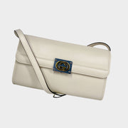 Gucci Interlocking GG Clutch in white leather - luxury designer bag with two-tone hardware, available at Glamorizta South Africa