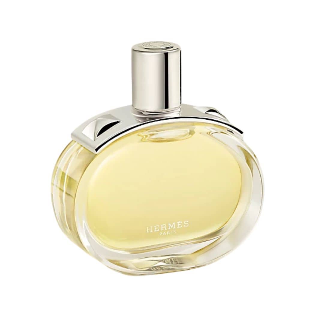 Front view of the Hermès Barénia Eau de Parfum bottle highlighting the warm golden liquid and silver cap detail.
