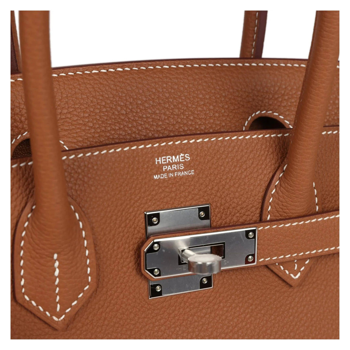 Close-up detail view of silver palladium hardware, padlock, and hanging leather key clochette on the Hermès Birkin 30 Gold bag.