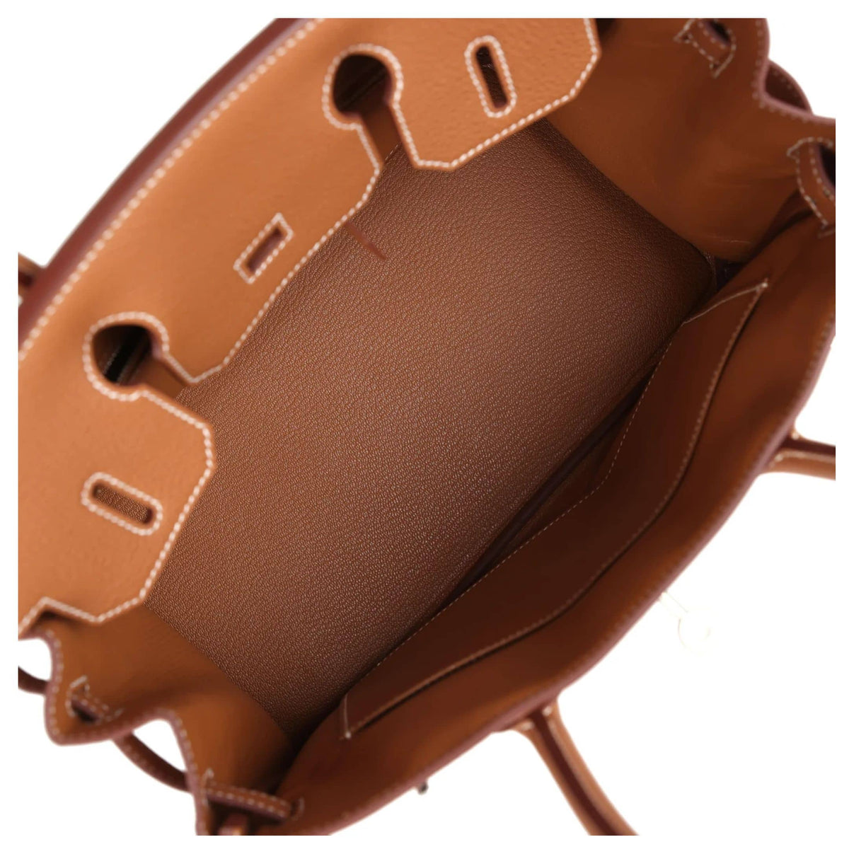 Open interior view of Hermès Birkin 30 in Gold leather showing spacious main compartment, inner zip pocket, and soft leather lining.