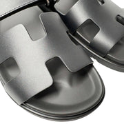 Hermès Chypre Sandals in black leather