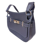 Three-quarter perspective view of Hermès Jypsière bag showcasing the wide shoulder strap and spacious messenger compartment.