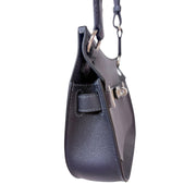 Side profile view of Hermès Jypsière leather handbag detailing side gussets and secure shoulder strap attachment.