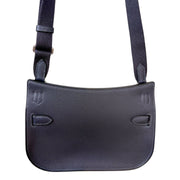Rear view of Hermès Jypsière leather messenger bag showing clean back panel and structured saddle bag silhouette.