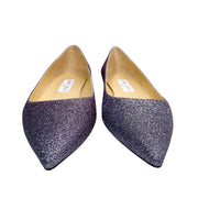 A direct glance at the inner ivory leather lining of the pointed flats, showcasing the clean dual-toned silhouette and polished construction.