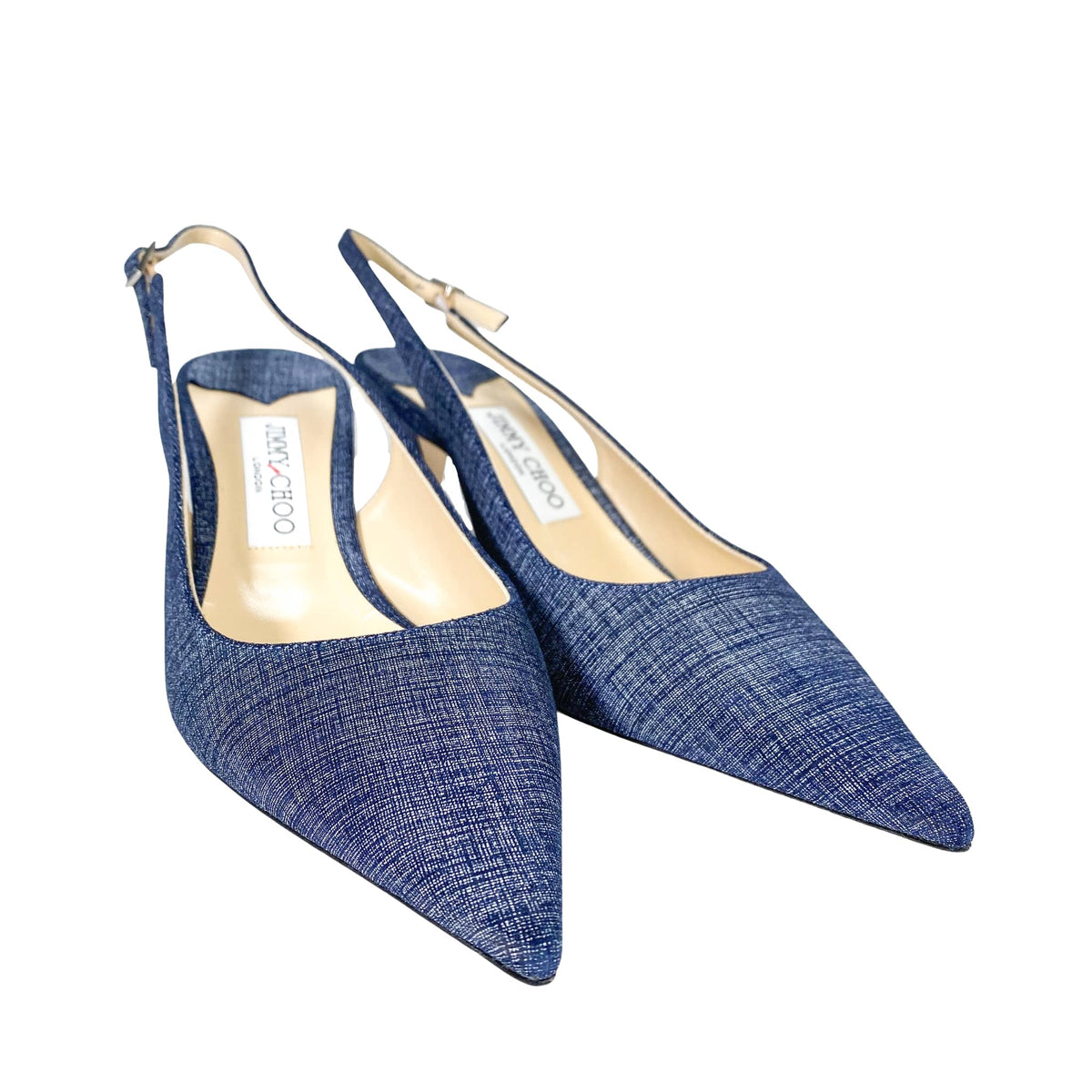 Front view of a pair of Jimmy Choo Harper 65 pointed-toe blue denim slingback pumps displayed on a studio background.