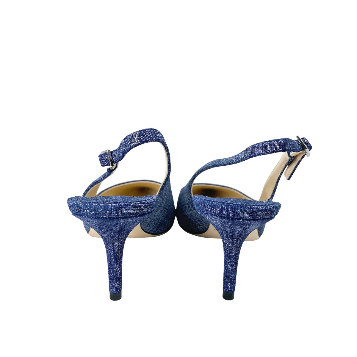 Back angle view highlighting the 65mm stiletto kitten heels and slingback straps on a pair of Jimmy Choo Harper shoes.