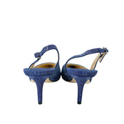 Back angle view highlighting the 65mm stiletto kitten heels and slingback straps on a pair of Jimmy Choo Harper shoes.