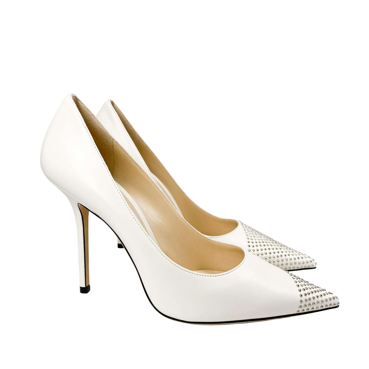 Side profile view highlighting the dramatic pointed toe and slim 100mm stiletto heel of the Jimmy Choo Love pump.