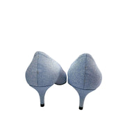 Rear view of Jimmy Choo Aza 50 light blue glitter kitten heels highlighting the heel counters and 50mm mid heels.