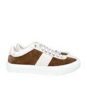 Side profile view of Jimmy Choo Portman trainer displaying brown suede stripe detail and thick white rubber sole.