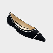 Side profile of Jimmy Choo Romy flats in black suede featuring delicate pearl trim along the collar and a sharp pointed toe.