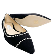 Close-up detail view of the pointed toe and faux pearl embellishments along the piping of the Jimmy Choo Romy flat.