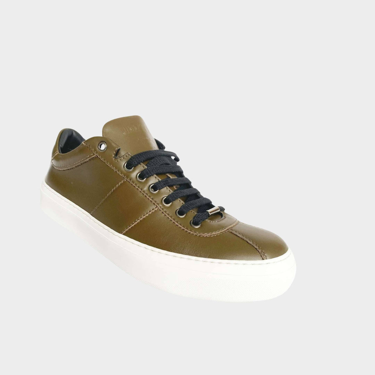 Jimmy Choo Portman men's low-top sneaker in olive green nappa leather with white rubber sole.