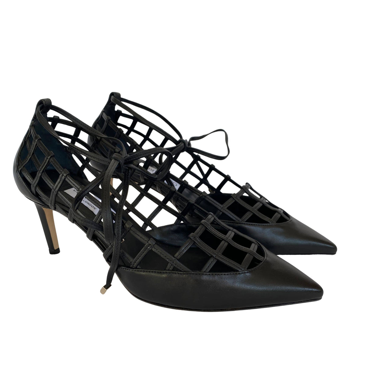 Three-quarter studio profile of Jimmy Choo Soraya 65 black leather latticed cutout heels on a clean white background.