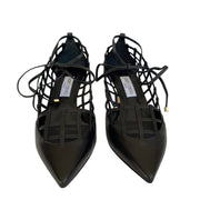 Direct front view of a pair of Jimmy Choo Soraya 65 black leather pointed-toe caged pumps.