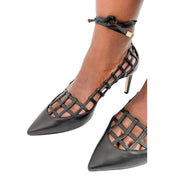 Angled on-foot view of Jimmy Choo Soraya 65 black leather lattice pumps showcasing the comfortable 65mm mid-height heel.