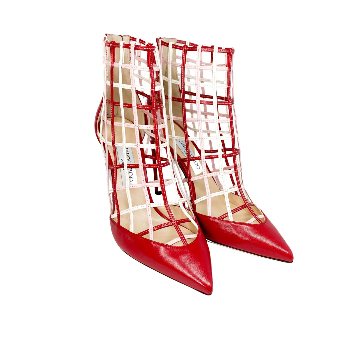 Three-quarter view of Jimmy Choo Sheldon 100 red leather caged bootie pumps on a white studio background.