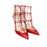 Three-quarter view of Jimmy Choo Sheldon 100 red leather caged bootie pumps on a white studio background.