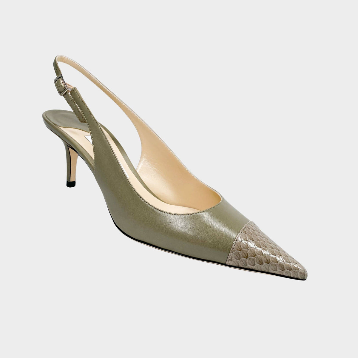 A crisp side profile view of the olive green Jimmy Choo Anika 65 pump, highlighting the elegant curve of the 65mm mid-heel and the distinctive snakeskin-textured pointed toe.