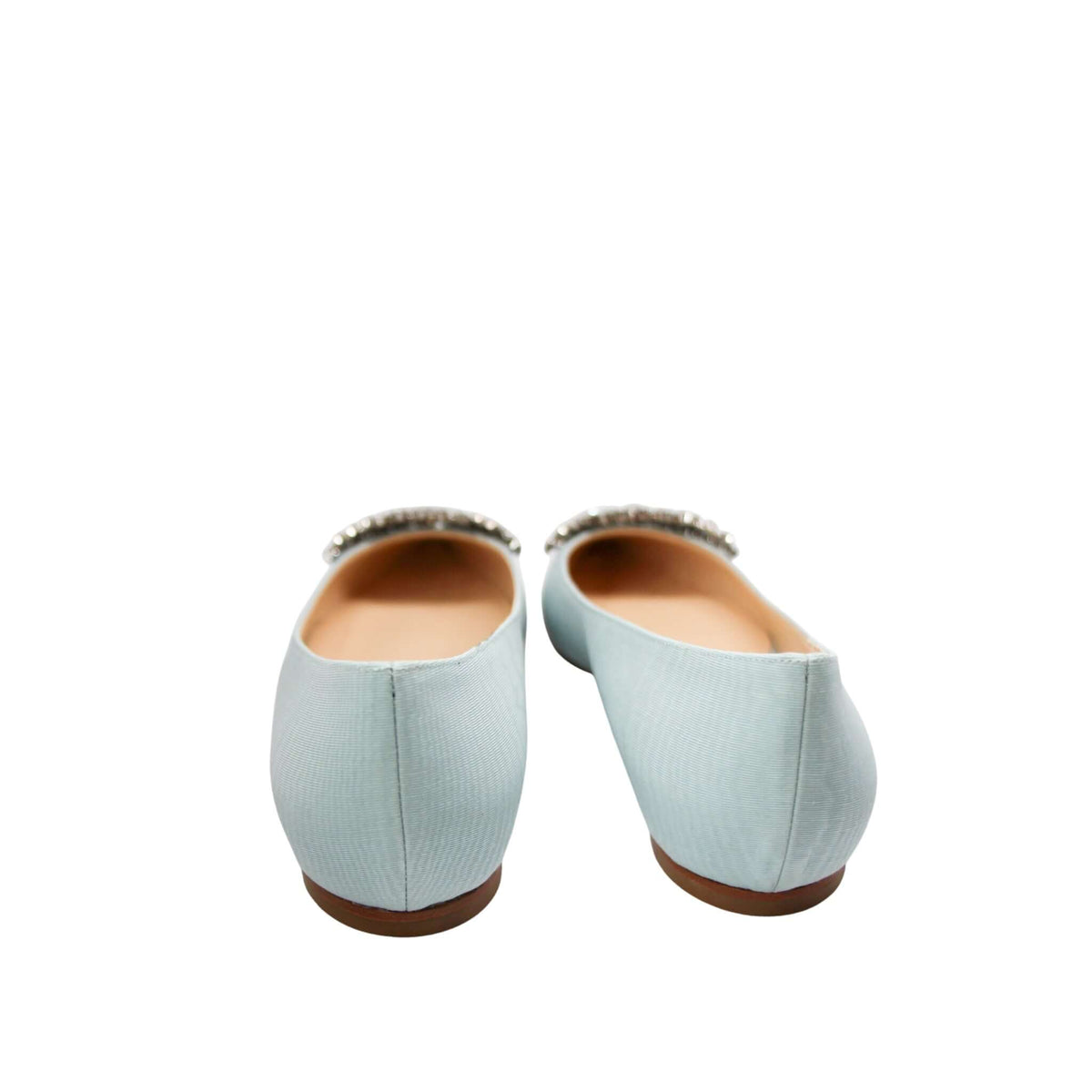 Back view showcasing the clean silhouette and heel profile of Jimmy Choo Romy blue flats
