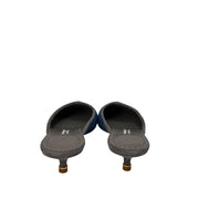Rear view of Manolo Blahnik Ajita 30 felt mules highlighting the grey suede 30mm kitten heels and heel counters.