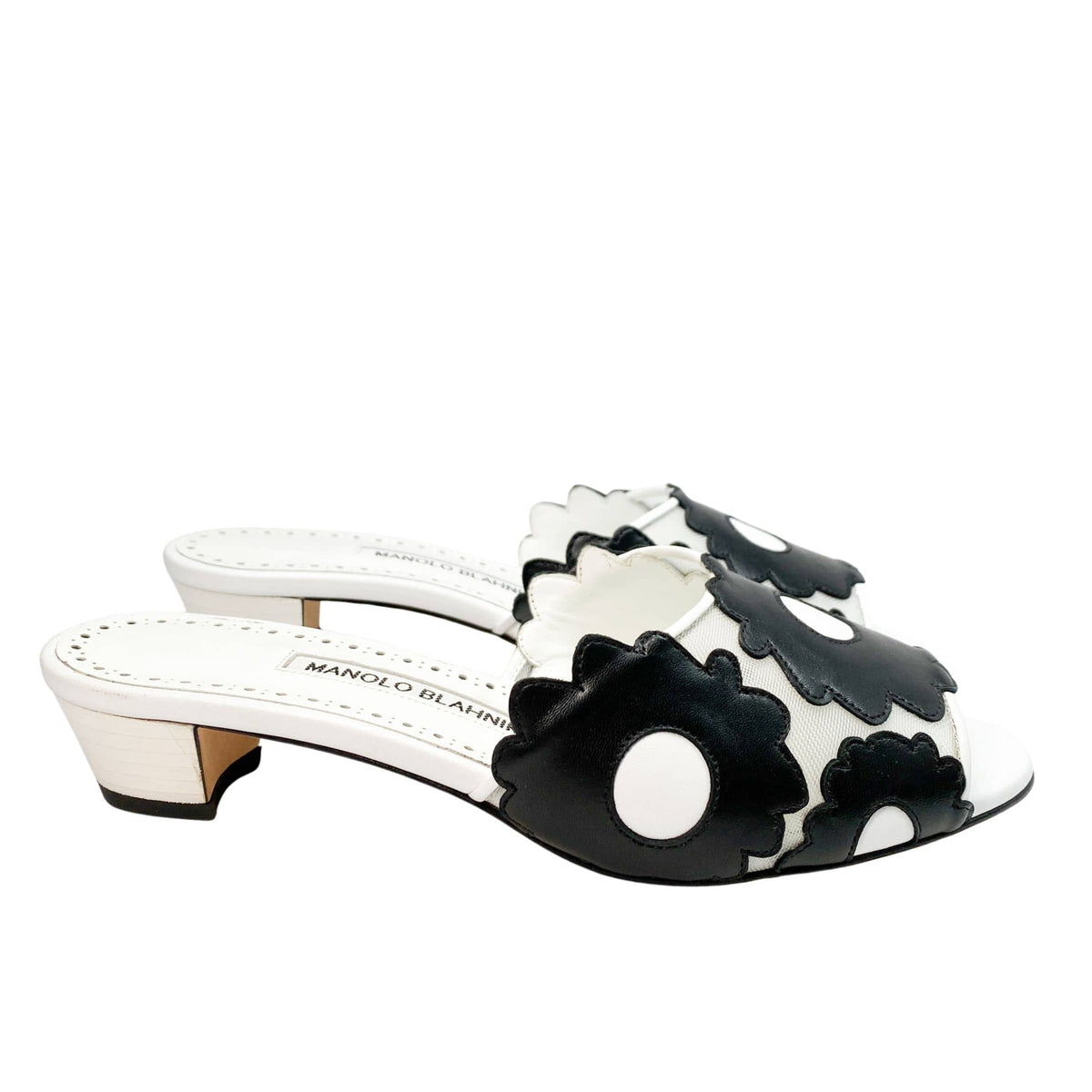 Side profile shot of the Manolo Blahnik Lottara 30 sandal showcasing the comfortable 30mm heel height and smooth leather upper.