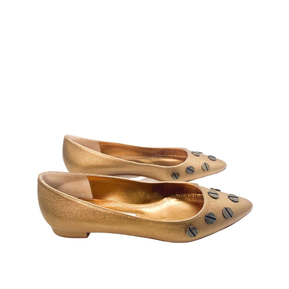 Side profile view of a pair of Manolo Blahnik Panunzia bronze metallic flats set against a clean white background.