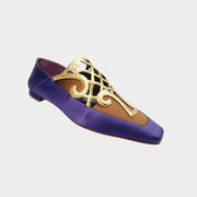 Manolo Blahnik Abukov flats in purple satin with an elegant gold cutout overlay design.