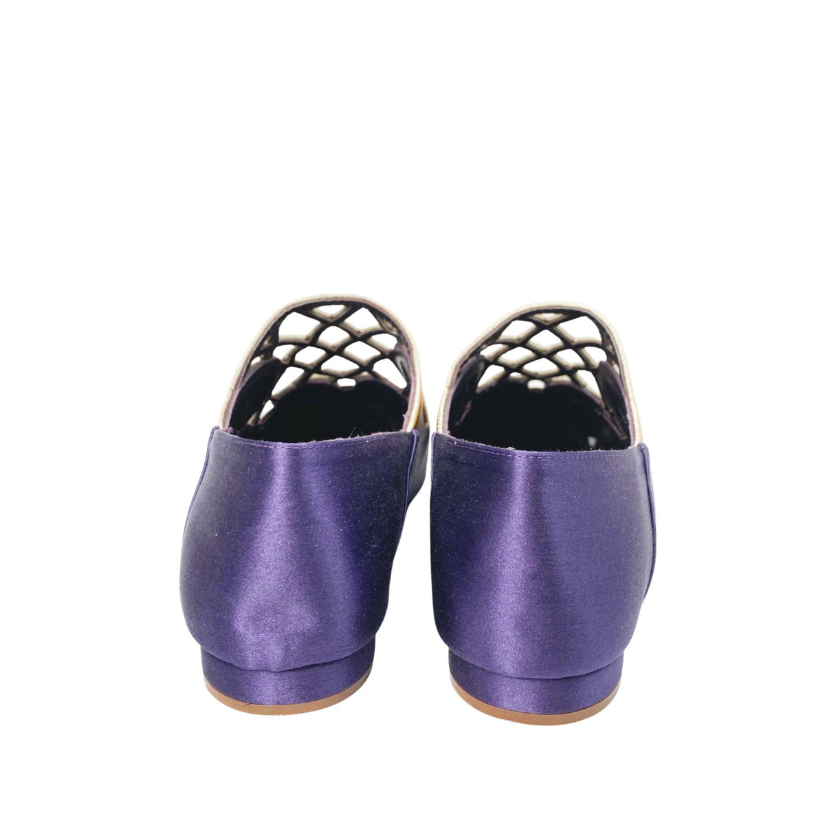 Rear view of the purple satin Manolo Blahnik Abukov slip-on flats highlighting the minimalist heel and back profile.