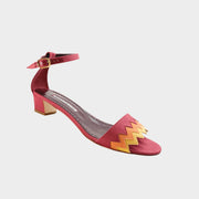 Side profile view of Manolo Blahnik Lochpri red canvas kitten heel sandal featuring a zig-zag patterned vamp and adjustable ankle strap.