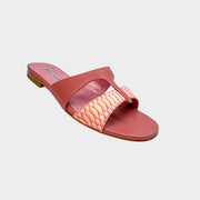 Side profile view of Manolo Blahnik Popilla flat leather sandals in pink featuring a woven patterned cross-strap design and low stacked heel.