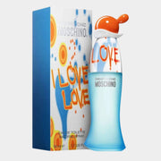 Moschino I Love Love Eau de Toilette sculpted blue glass bottle standing next to its colorful graffiti retail box packaging.