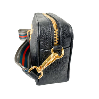 Prada camera bag in black leather with gold hardware and webstrap