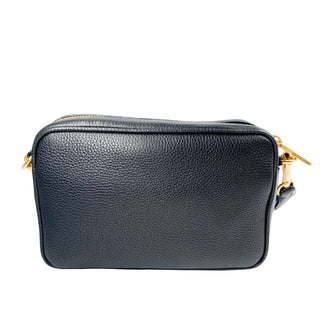 Prada camera bag in black leather with gold hardware and webstrap