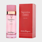 Salvatore Ferragamo Signorina In Fiore Body Mist spray bottle standing next to its pink rectangular retail packaging box.