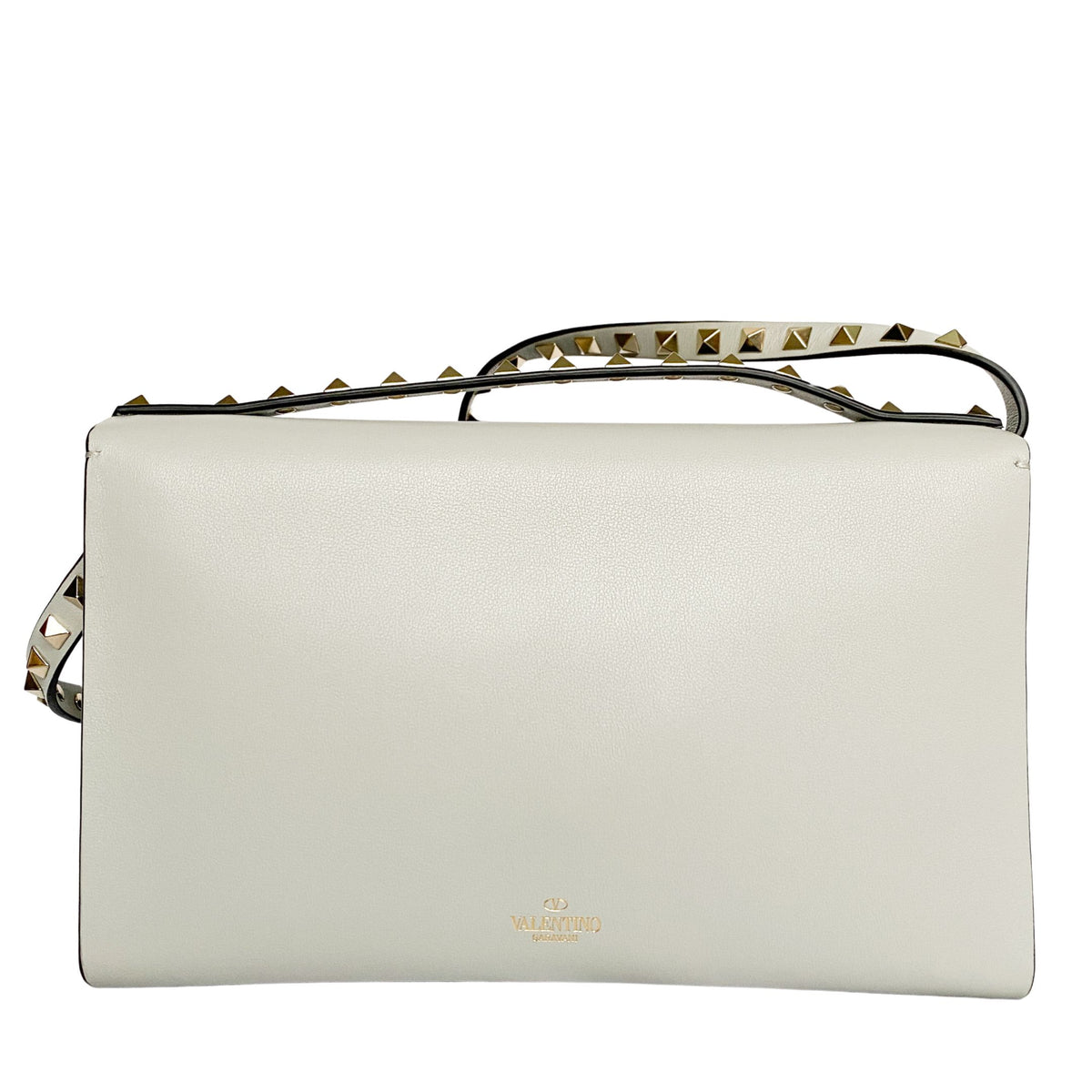Back view of the off-white Valentino Rockstud clutch showing smooth leather and shoulder strap hooks.