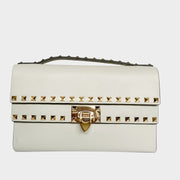 Valentino Rockstud clutch bag in cream white leather featuring gold pyramid studs and top handle.