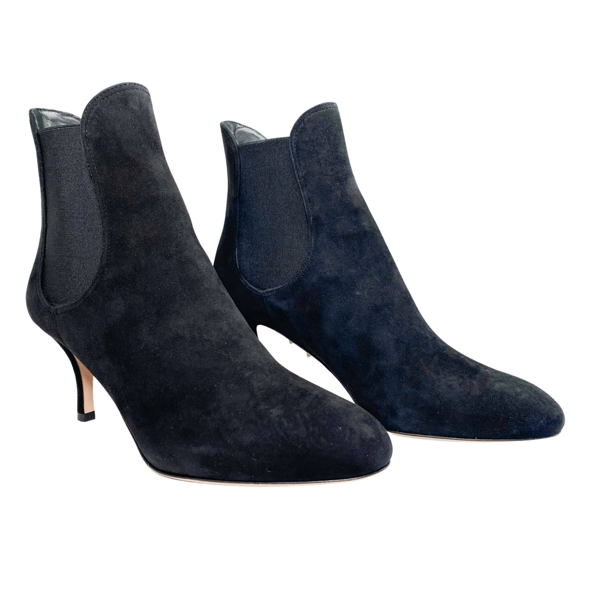 Pair view of black suede Valentino Beatle Booties showcasing mid-height ankle silhouette and elastic gussets.