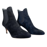 Pair view of black suede Valentino Beatle Booties showcasing mid-height ankle silhouette and elastic gussets.