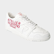 Valentino Garavani Atelier Mens Trainers in white leather featuring red logo text.