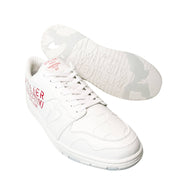 Low-angle perspective view of white Valentino Atelier leather sneakers resting side-by-side.