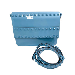 Valentino Patent Crossbody Bag showcasing a glossy patent finish and sleek designer silhouette