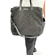 Versace Nylon Bag worn by a model, available at Glamorizta South Africa.