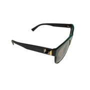 Side profile view of the gray Versace sunglasses, showcasing the iconic gold-tone Medusa emblem detailing on the temple.