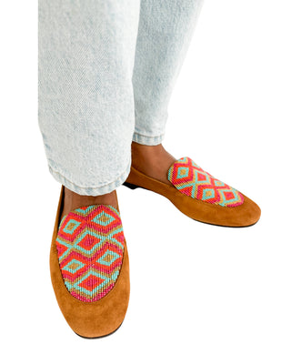 Aquazzura Masal loafers styled on foot styled with jeans