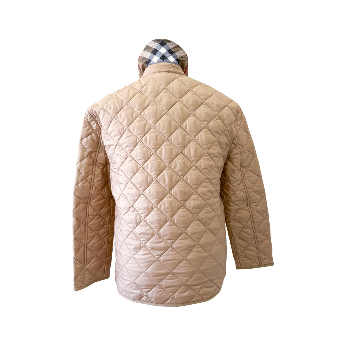 Full-length back view of the Burberry Dalry quilted jacket in camel, highlighting its flattering tailored silhouette.